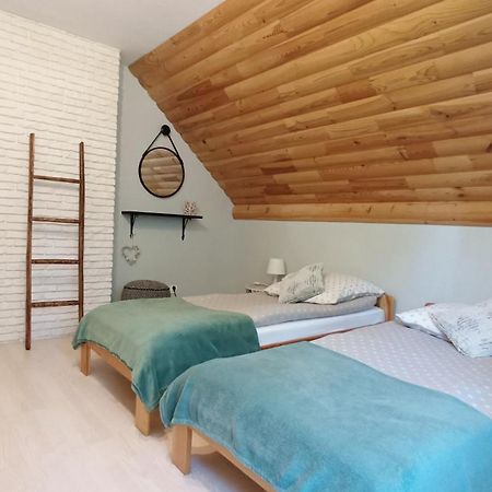 ルトビスカ Zacisze Drwalaゲストハウス 部屋 写真
